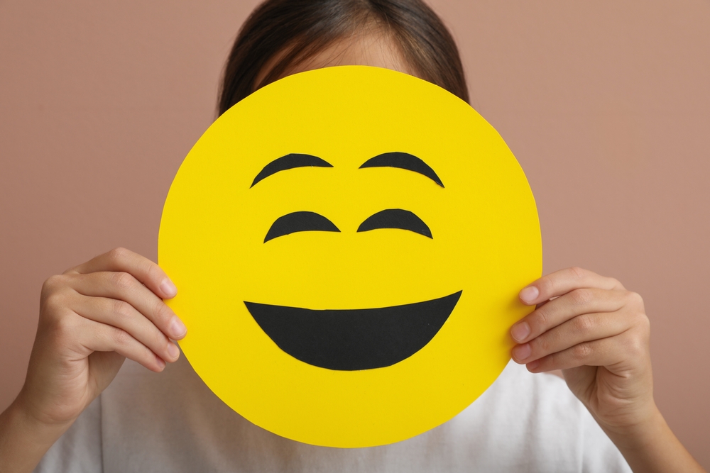 Lottery Winner Hides Behind Emoji Mask After Claiming 1.4 Million Dollar Prize