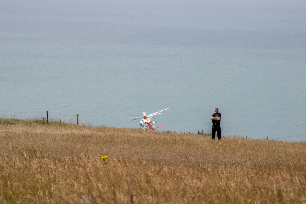 A Helicopter Pilot Saw a Man Posing for a Photo on a Cliff. What He Did Next Nobody Expected.