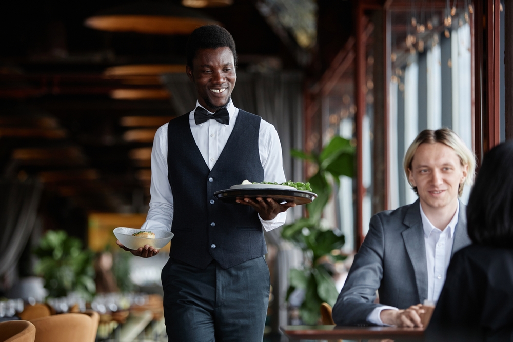 A Waiter Fed a Diner with Cerebral Palsy So His Caregiving Mother Could Eat a Hot Meal