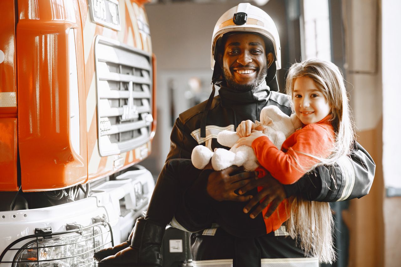 Firefighters Comfort Frightened 2-Year-Old Girl After Car Crash by Letting Her Paint Their Nails