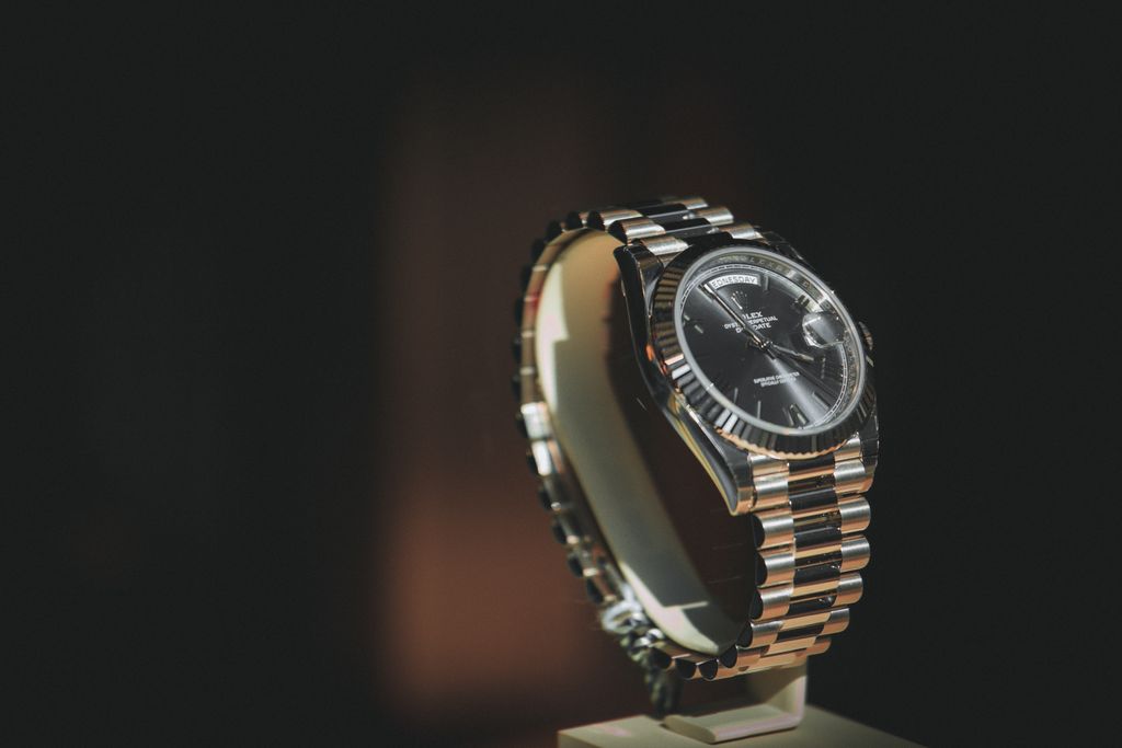 A close-up shot of a luxury watch with a metallic bracelet, showcasing elegance and precision.